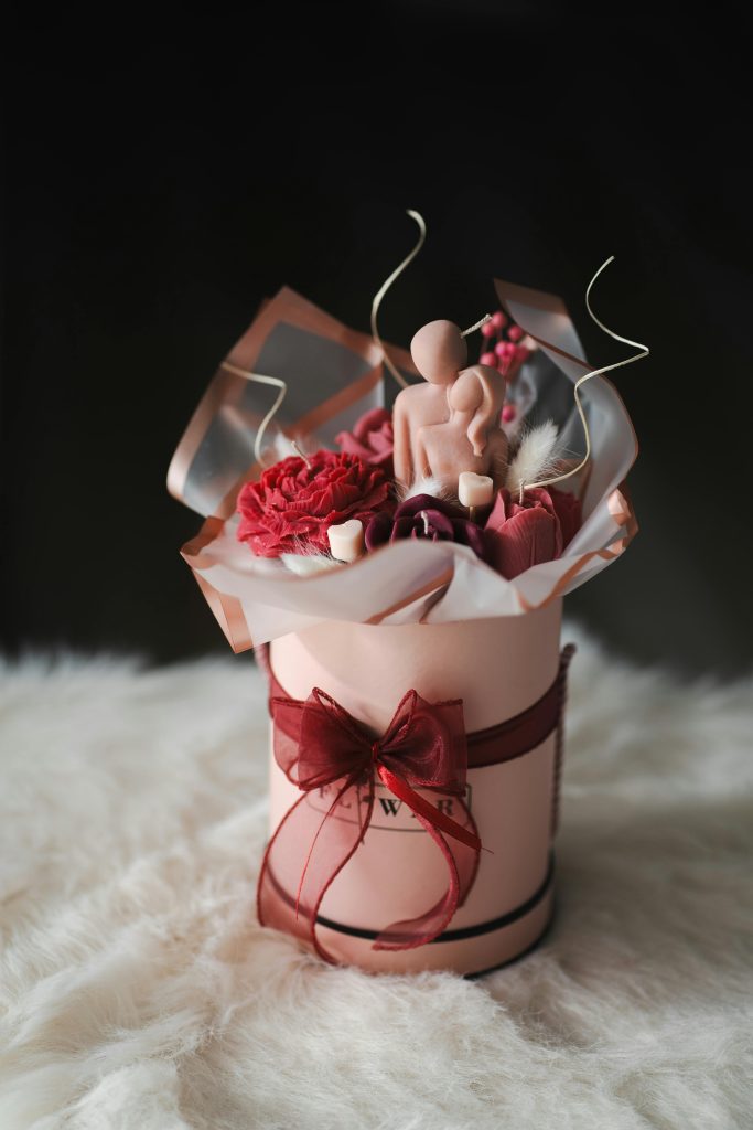 a flower bouquet as gifts for her